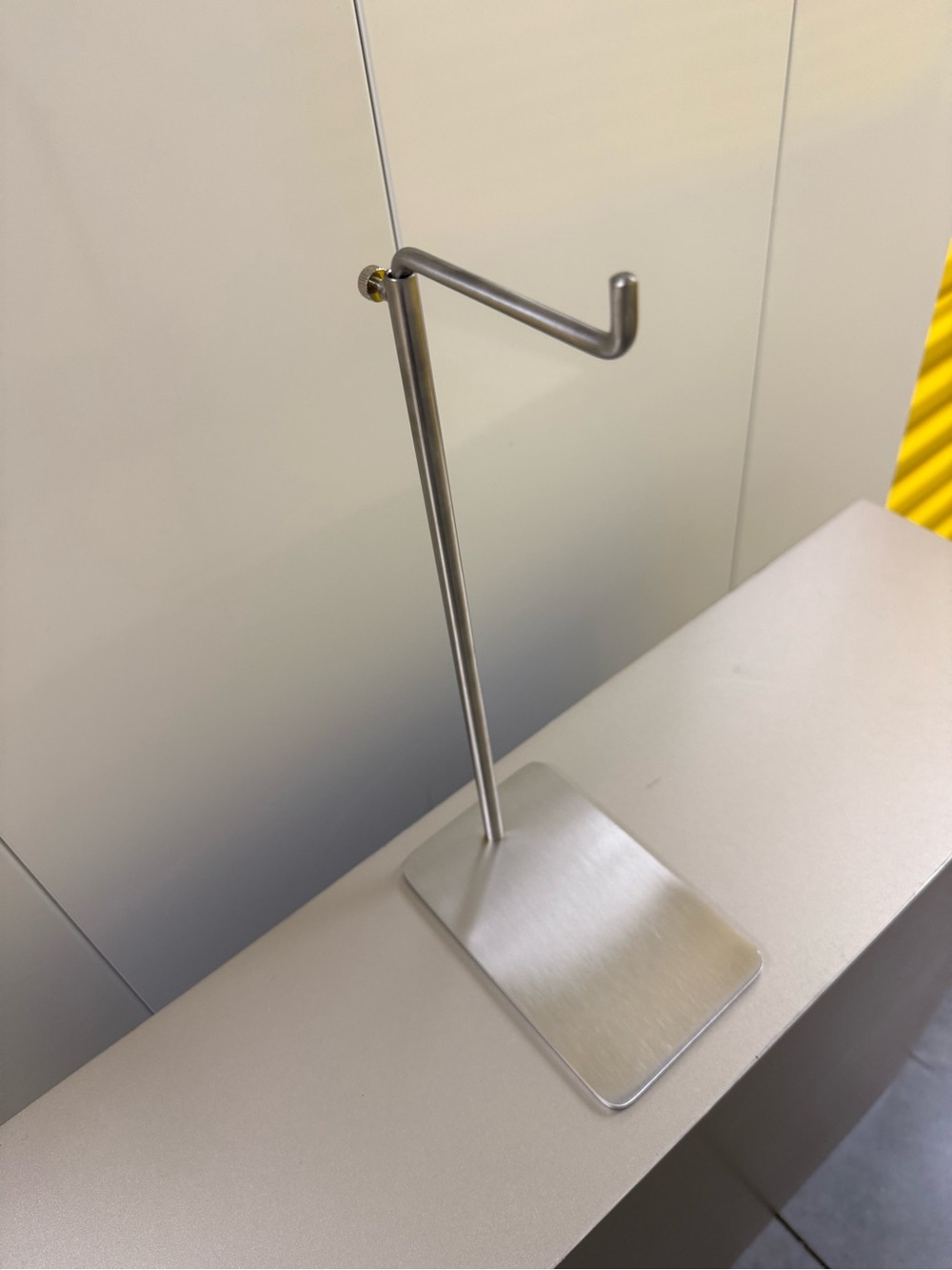 Minimalist Metal Display Stand in Brushed Silver